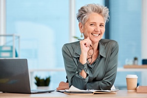 senior woman at front desk